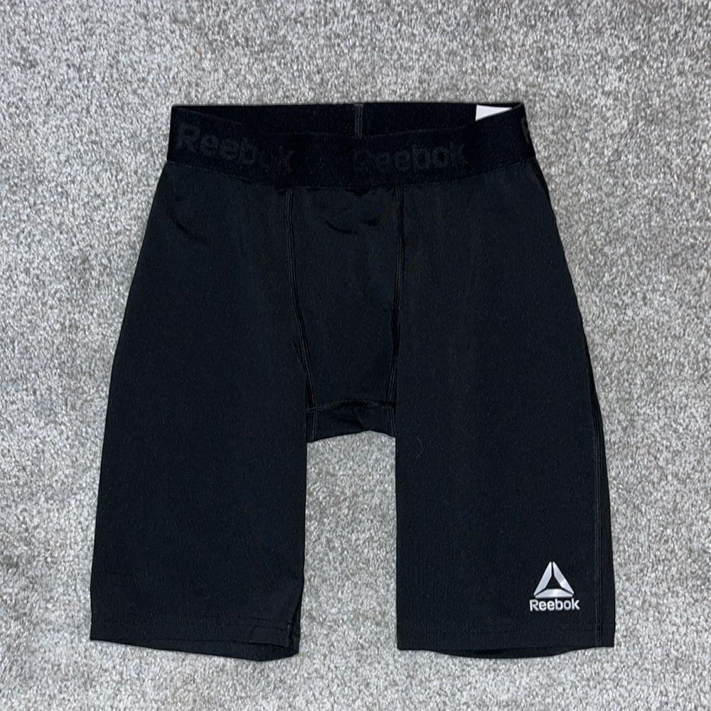 Lightly worn Black stretch Reebok basketball stretch compression shorts- M